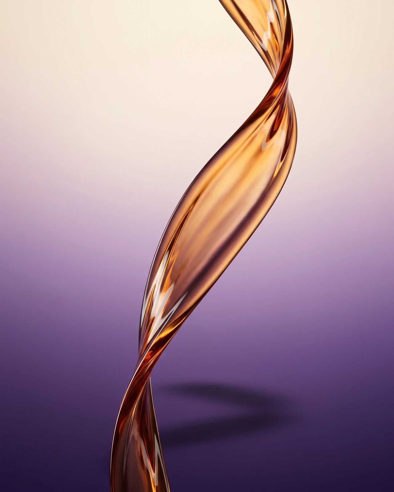 A translucent ribbon of amber oil twisting on a cream-to-violet ground — the purified Bakuchiol active.